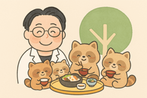 タヌキの一家が食卓を囲んでいる様子を医師が見守っている画像